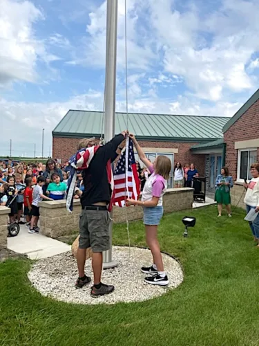 GMG Elementary, Gladbrook American Legion and Auxiliary mark back to school with flag raising ceremony